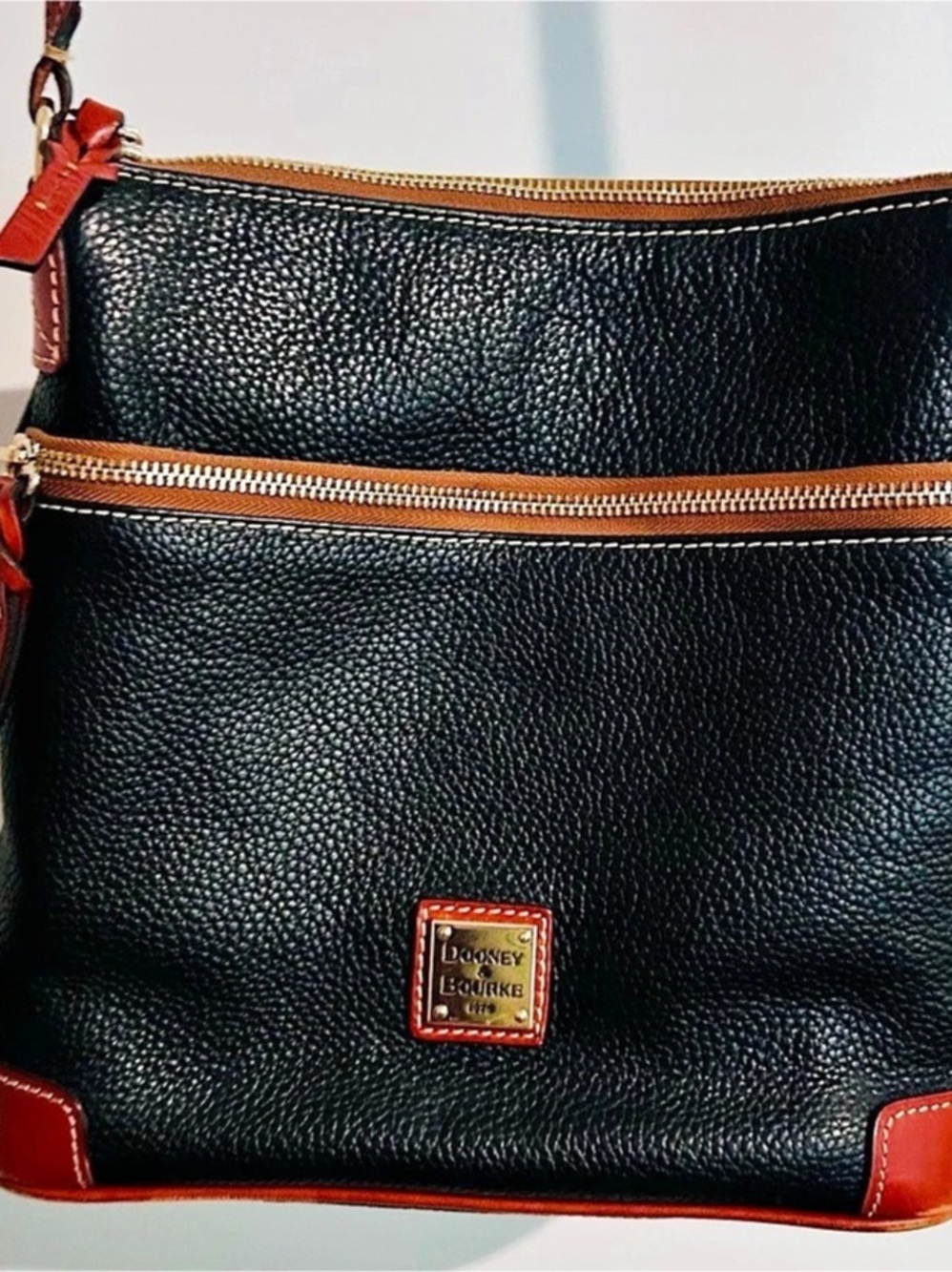Dooney & Bourke Pebbled Leather Crossbody in Navy & Brown